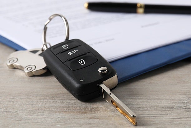Car Keys On Paperwork